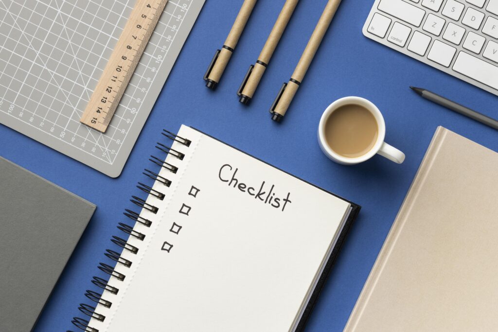 article-top-view-notebook-with-checklist-desk